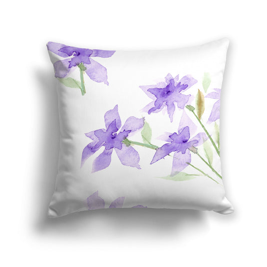 Decorative pillow with purple floral watercolour print on a white background