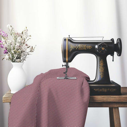 Pale Cream Cotton Sateen Fabric with Burgundy Red Double Weave Motif Print, FASC-1283-144, on an antique sewing machine sitting on a desk with vase of beautiful flowers.