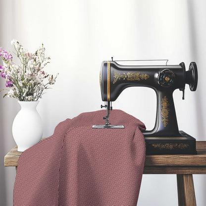 Beige Cotton Sateen Fabric with Burgundy Red Double Weave Motif Print, FASC-1285-144, on an antique sewing machine sitting on a desk with vase of beautiful flowers.
