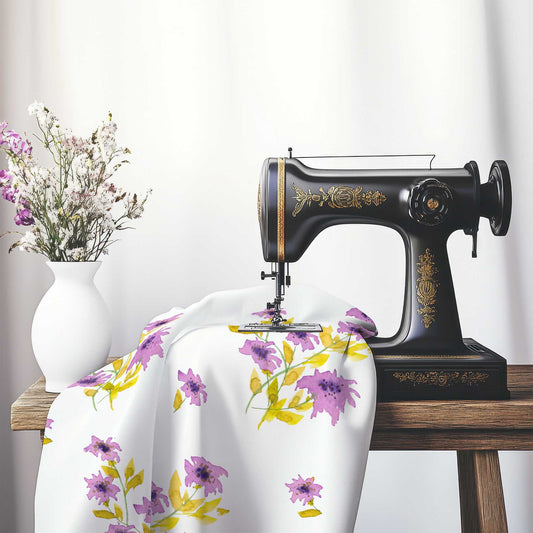 Printed Fabric with Handpainted Mauve Watercolor Floral, FACS-1364, on an antique sewing machine sitting on a desk with vase of beautiful flowers.