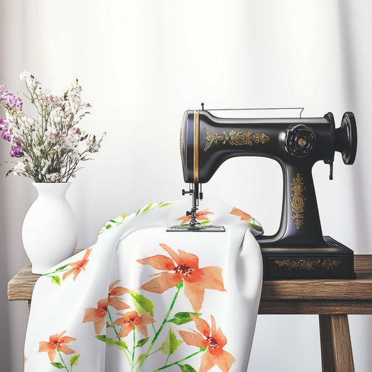 Printed Fabric with Handpainted Red Watercolor Floral, FACS-1384, on an antique sewing machine sitting on a desk with vase of beautiful flowers.