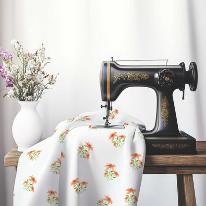 Printed Fabric with Handpainted Red Watercolor Floral Pattern, FACS-1385, on an antique sewing machine sitting on a desk with vase of beautiful flowers.