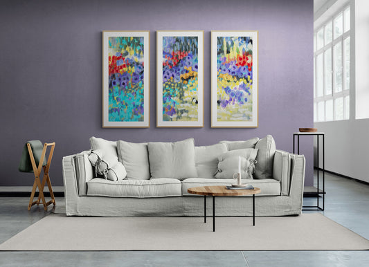 Wildflower Garden Fine Art Print Triptych | Styled in Airy Lavender Living Room with Oversized Grey Linen Sofa, Rattan Coffee Table, Minimal Black Side Table and Concrete Tile Floor