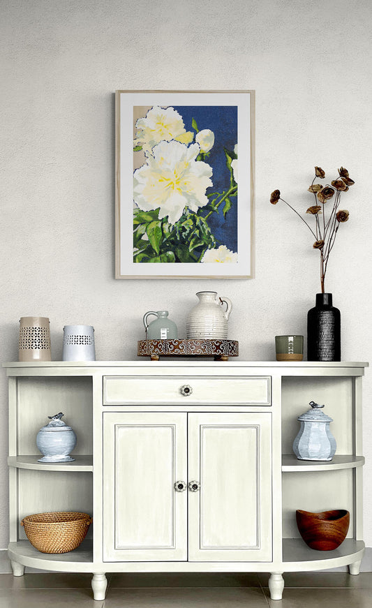 White Peonies Fine Art Print | Styled in Elegant French Country Entryway with Cream Demilune Sideboard, Turned Legs, Ornate Tray, Stacked Ceramic Pitchers, Black Woven Vase with Dried Stems and Wicker Basket